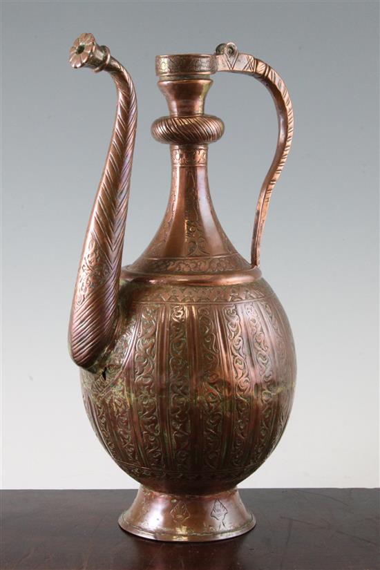 A 17th century safavid copper ewer, 13.5in.